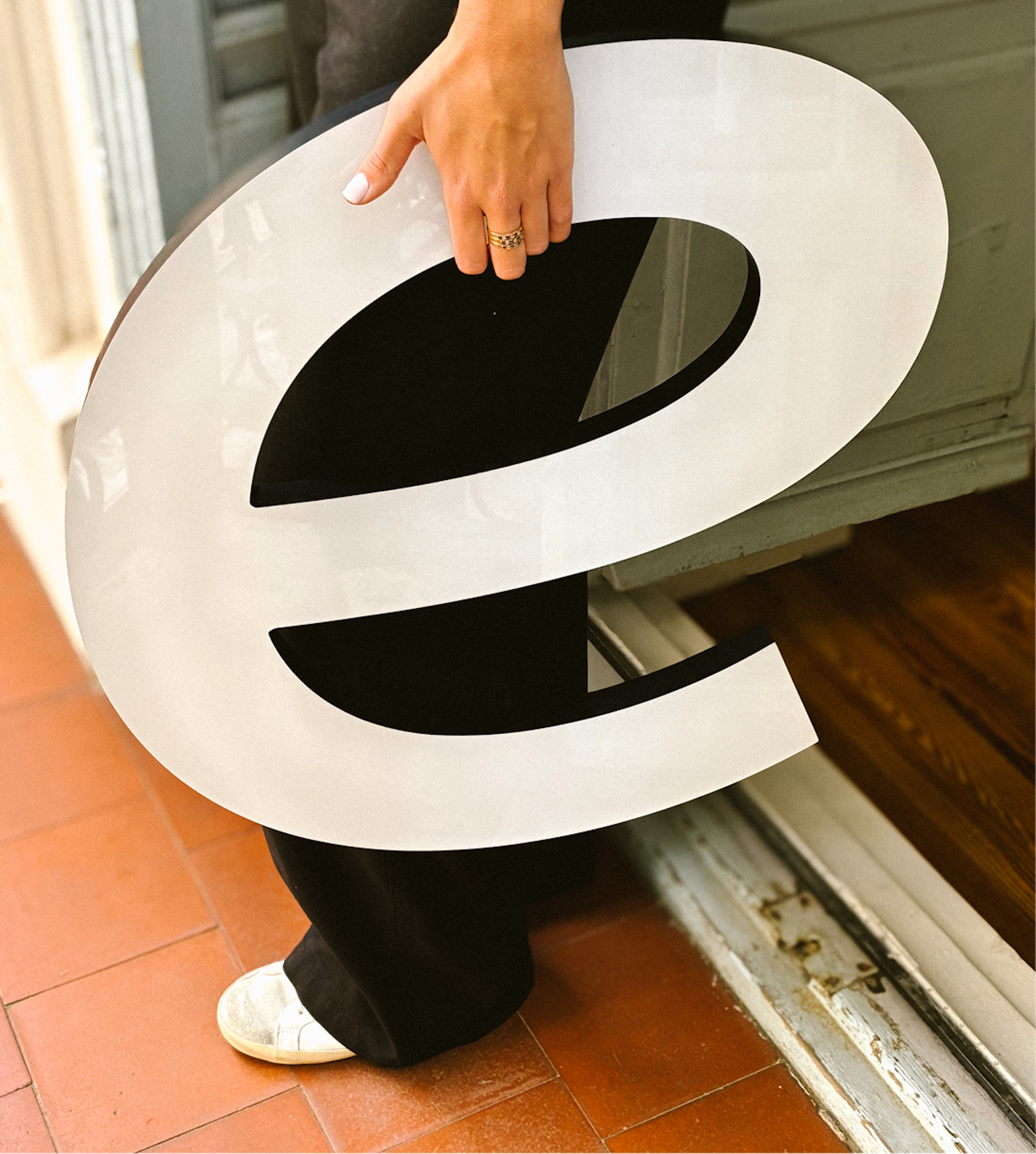 Physical letter of the Repsol Logo font